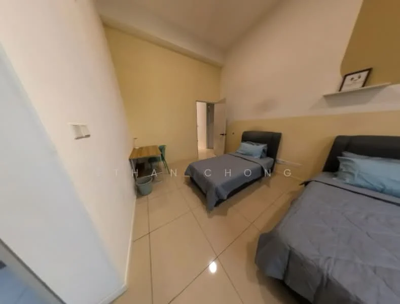 Bedroom features: two single beds with grey bedding, light yellow painted walls, glossy tile flooring, study table with chair, window with natural light, door leading to hallway, minimalist decor shelf on wall, high ceiling; style: modern.