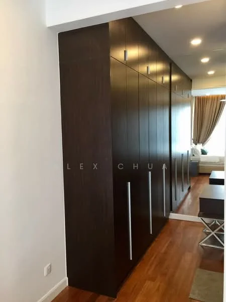 Room features: dark wood cabinetry, built-in storage units, smooth surface finish, multiple cabinet doors, modern handles, laminate flooring, recessed ceiling lights, neutral wall colour; style: modern.