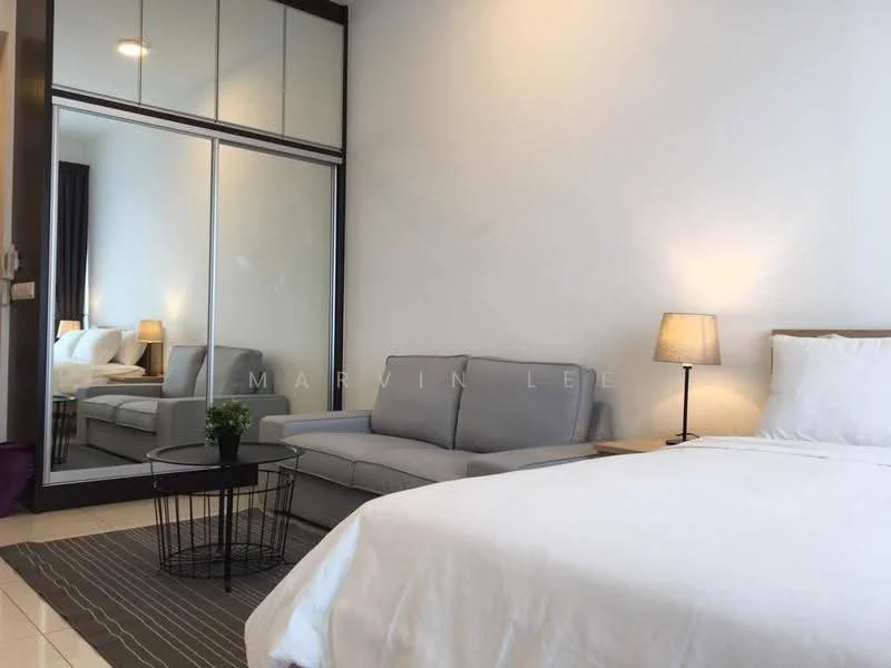 Bedroom features: queen-size bed with white bedding, upholstered headboard, grey fabric sofa, round black coffee table, decorative plant in pot, floor-to-ceiling mirror wardrobe, white painted walls, tile flooring, table lamp with beige shade, curtains in dark grey, area rug with striped pattern; style: modern.