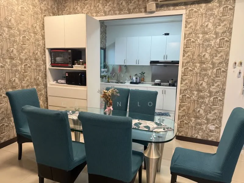 Dining features: glass dining table, 6 upholstered dining chairs in teal, decorative vase with flowers, wallpaper with floral pattern, white cabinetry, built-in microwave, black countertop appliances, kitchen area visible in background; style: modern. Kitchen features: white cabinets, stainless-steel sink, built-in stove, kitchen utensils visible, wall-mounted cabinets; style: modern.