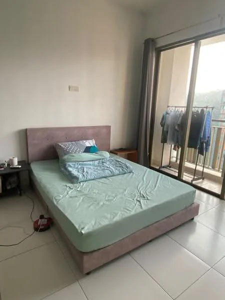Bedroom features: queen-size bed with upholstered headboard, light green bedspread, white pillows, nightstand with drawer, table lamp, floor-to-ceiling sliding glass door, curtains, wardrobe with clothes hanging, white tiled flooring, plain white walls; style: modern; view: city.
