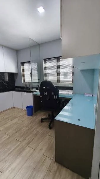 Room features: light wood flooring, white cabinetry, black countertop, glass partition, blue desk surface, office chair, window with blinds, blue waste bin; style: modern.