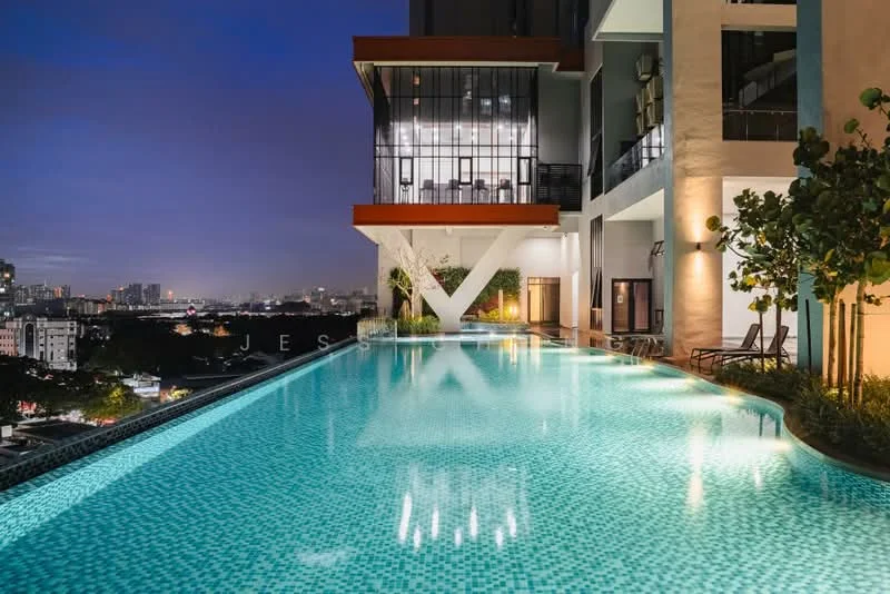Exterior type: high-rise condominium; features: infinity pool, pool deck with loungers, glass railing, landscaped garden area, city skyline view, outdoor dining area, modern architectural design, illuminated pool at night; style: modern.