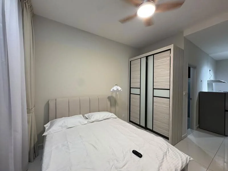 Bedroom features: queen-size bed with upholstered headboard, white bedding, 2 bedside lamps, built-in wardrobe with sliding doors, white walls, ceiling fan with light, tile flooring, curtains, remote control on bed; style: modern.