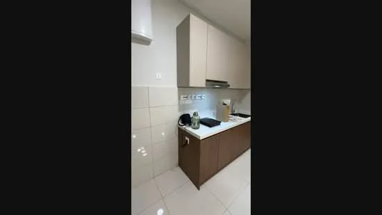 Kitchen features: light wood cabinetry, white countertop, stainless-steel sink, chrome pull-down faucet, built-in gas stove, white tiled backsplash, cream painted walls, glossy floor tiles; style: modern.