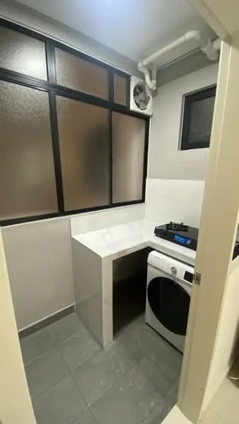 Laundry features: white countertop, grey tiled flooring, front-load washing machine, gas stove, black framed windows, wall-mounted split AC, light grey painted walls; style: modern.