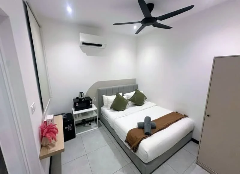 Bedroom features: queen-size bed with grey upholstered headboard, white bedding, two green decorative pillows, grey throw blanket, 5-blade ceiling fan with light, wall-mounted split AC unit, nightstand with drawer, coffee machine, mini fridge, grey tile flooring, white painted walls, built-in wardrobe with sliding door; style: modern.