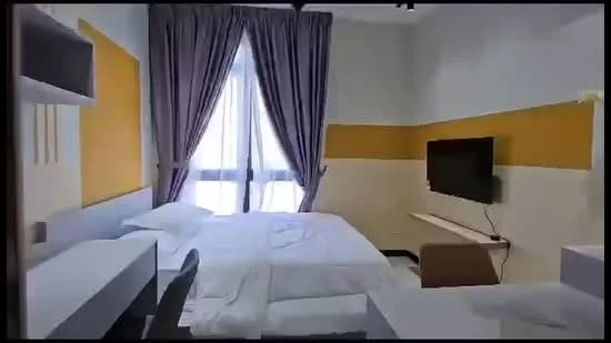 Bedroom features: queen-size bed with white bedding, two bedside tables, wall-mounted TV, curtains in grey, yellow accent wall, white painted walls, desk with chair, floor-to-ceiling windows, light fixture on ceiling; style: modern.