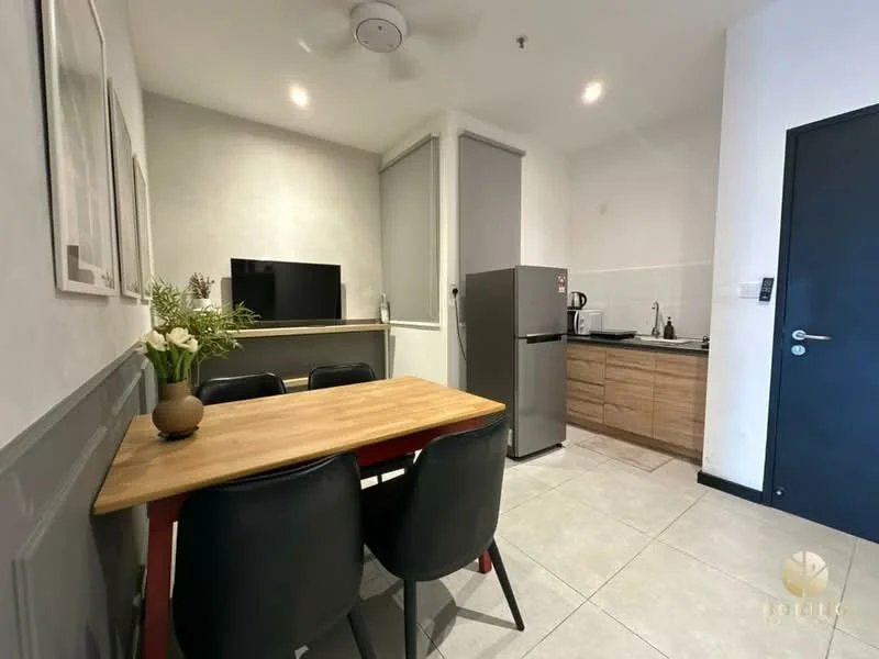 Kitchen features: grey painted walls, tile flooring, ceiling fan, wood cabinetry, stainless-steel fridge, built-in countertop, sink, kitchen appliances visible, dining table with four black chairs, TV on wall shelf; style: modern.