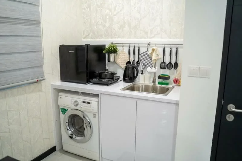 Laundry features: white cabinetry, white countertop, stainless-steel sink, single-bowl stainless-steel sink, black fridge, black kettle, gas stove, washing machine, hanging utensils, wall-mounted shelf, decorative plant, grey roller blinds, textured wall finish; style: modern.