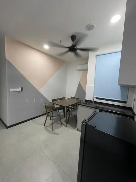 Kitchen features: grey tiled flooring, white painted walls, accent wall with pink and blue geometric design, ceiling fan, dining table with four chairs, black fridge, wall-mounted air conditioning unit, kitchen cabinetry, countertop, window with roller blinds; style: modern.