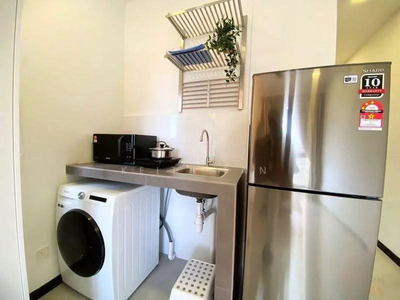 Laundry features: white washing machine, stainless-steel sink, chrome faucet, grey countertop, black microwave, stainless-steel fridge, open shelving, white step stool, decorative plant; style: modern.