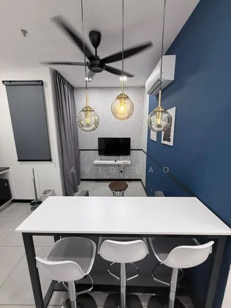 Living features: grey accent wall, white painted walls, tile flooring, 5-blade ceiling fan in black, pendant lighting with glass globes, wall-mounted TV, sofa, bar counter with three white stools, air conditioning unit, curtains, decorative artwork; style: modern.