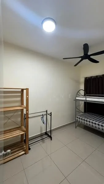 Bedroom features: bunk bed with mattress, wooden shelving unit, metal clothing rack, cream painted walls, grey floor tiles, ceiling light fixture, ceiling fan, dark curtains.