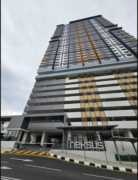 Exterior type: high-rise condominium; features: glass curtain wall, exposed concrete facade, projecting balconies, feature lighting at night, multi-storey car park, guard house at entrance, gated entry, driveway with interlocking pavers; style: modern.