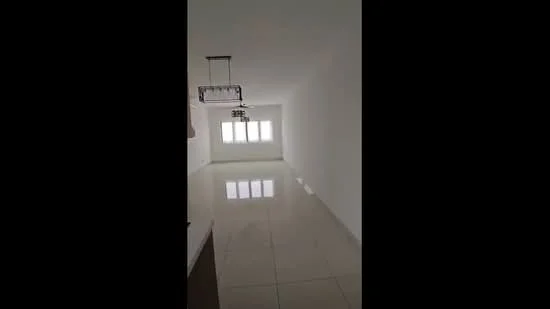 Room features: white painted walls, glossy tile flooring, recessed downlights, large windows, open layout, neutral color scheme, minimalist design, no visible furniture; style: modern.