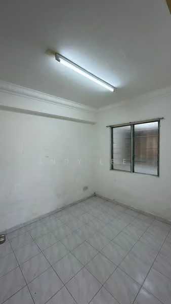 Room features: white painted walls, tile flooring, fluorescent ceiling light, single window, no visible furniture.