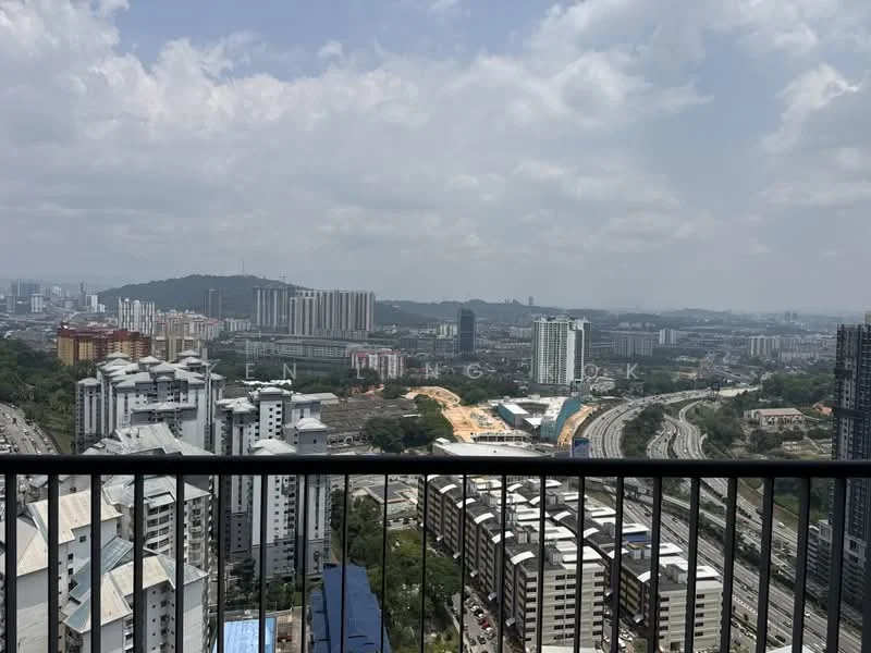 Exterior type: high-rise condominium; features: city skyline view, surrounded by urban development, visible highways, multiple high-rise buildings, open-air balcony railing, greenery in the distance, construction site visible, cloudy sky; style: modern.