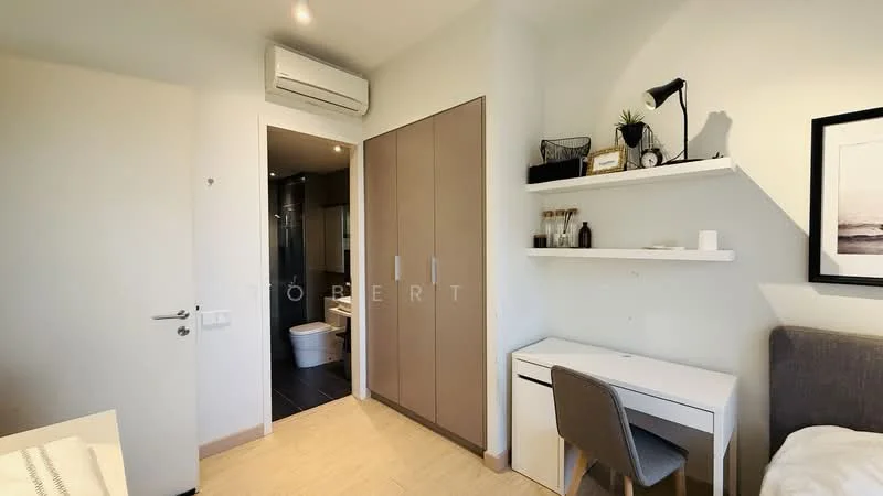 Bedroom features: light wood flooring, white painted walls, built-in wardrobe with sliding doors, study desk with chair, wall-mounted shelf, air conditioning unit, bedside lamp, framed artwork, window with natural light; style: modern. Bathroom features: toilet, sink, dark tile flooring, glass shower enclosure, mirror, wall-mounted storage, modern fixtures.