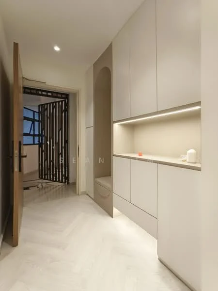 Room features: light wood herringbone flooring, white cabinetry with flat-panel design, built-in wall niche with lighting, recessed LED lighting, modern wooden door, decorative wall screen, neutral wall color, minimalist design; style: modern.