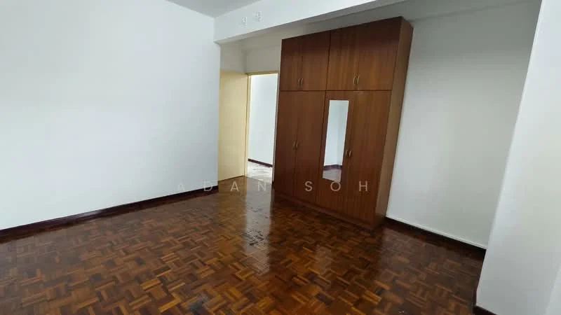 Room features: wooden parquet flooring, white painted walls, built-in wardrobe with mirror, single window, doorway leading to another room.