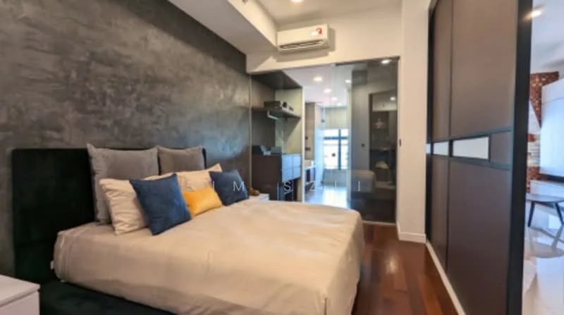 Bedroom features: king-size bed with upholstered headboard, bedding in neutral tones, decorative pillows in blue and yellow, wooden flooring, exposed concrete accent wall, wall-mounted split AC unit, built-in wardrobe with sliding doors, nightstand with lamp, large window with natural light, recessed lighting, decorative wall art; style: modern.