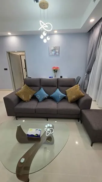 Living features: 3-seater fabric sofa in grey, decorative cushions in blue, glass coffee table with unique base, pendant light fixture with multiple bulbs, light grey painted walls, floor-to-ceiling curtains in light grey, framed artwork on wall, vase with flowers on coffee table, laminate flooring, recessed ceiling lights; style: modern.