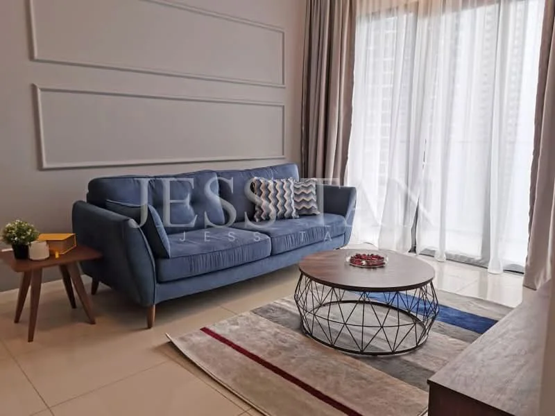 Living features: blue fabric 3-seater sofa, round coffee table with wireframe base, area rug with geometric pattern, cream painted walls, floor-to-ceiling windows, sheer curtains, light-colored tiled flooring, decorative plant on side table; style: modern.