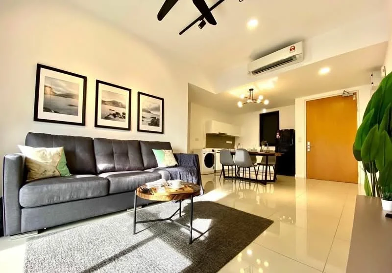 Living features: 3-seater fabric sofa in grey, coffee table, area rug with geometric pattern, wall-mounted TV, recessed LED downlights, ceiling fan, decorative wall art, sliding glass door, floor-to-ceiling windows, built-in cabinets, white painted walls, polished tile flooring, air conditioning unit; style: modern. Kitchen features: washing machine, open shelving, black cabinetry, stainless-steel sink, built-in oven, freestanding range oven, refrigerator, countertop with bar seating; style: modern.