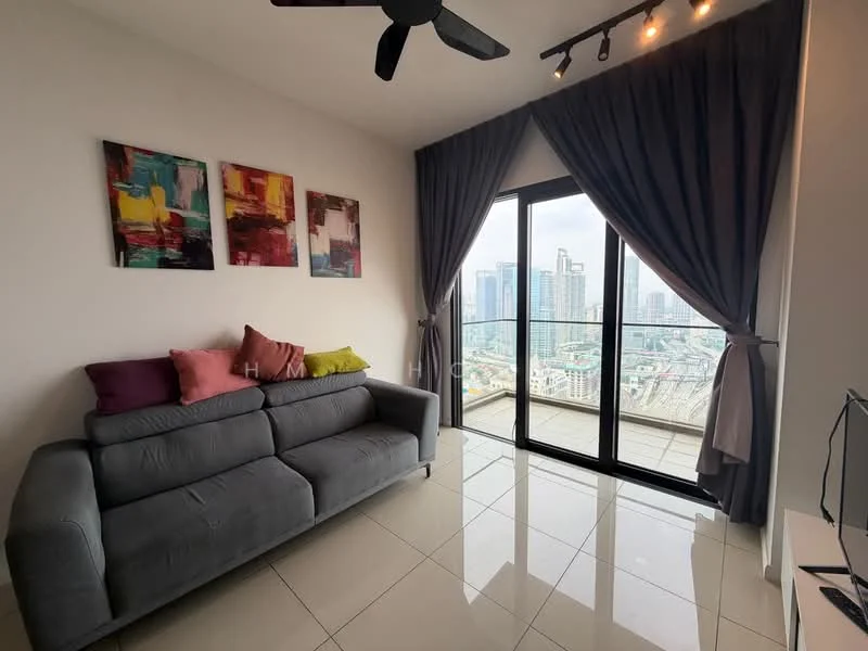 Living features: 3-seater fabric sofa in grey, colorful throw pillows in pink and green, floor-to-ceiling sliding glass door, curtains in dark grey, wall-mounted TV, decorative artwork on walls, white painted walls, glossy tile flooring, ceiling fan, recessed lighting; style: modern; view: city.