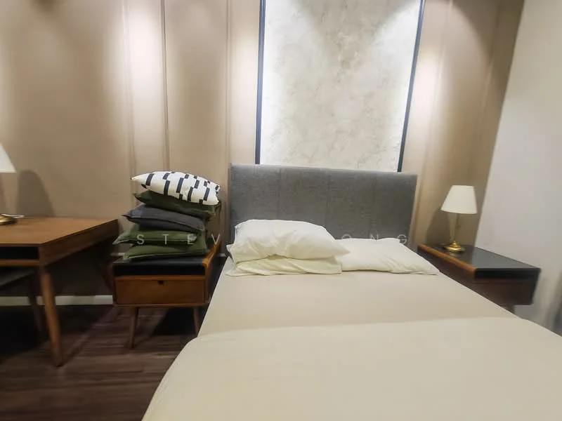 Bedroom features: queen-size bed, upholstered headboard, two bedside tables, table lamps on bedside tables, stacked pillows and blankets, wooden flooring, neutral wall color, decorative wall panel, recessed lighting; style: modern.