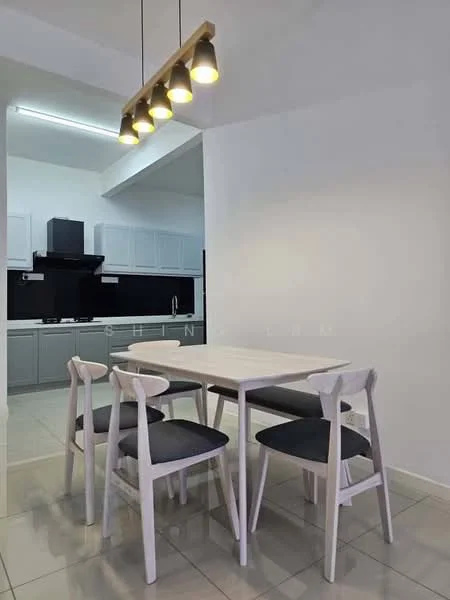 Dining features: white dining table, 4-seater dining table, upholstered dining chairs with dark cushions, pendant light with multiple bulbs, grey tiled flooring, white painted walls, kitchen area visible in background, black kitchen cabinetry, stainless-steel sink, built-in kitchen appliances; style: modern.
