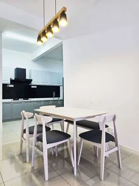 Dining features: white dining table, 4-seater dining table, wooden dining chairs with black cushions, pendant lighting with 3 bulbs, grey tiled flooring, white painted walls, open layout to kitchen, kitchen cabinetry visible in background, black kitchen backsplash, stainless-steel sink visible in kitchen; style: modern.