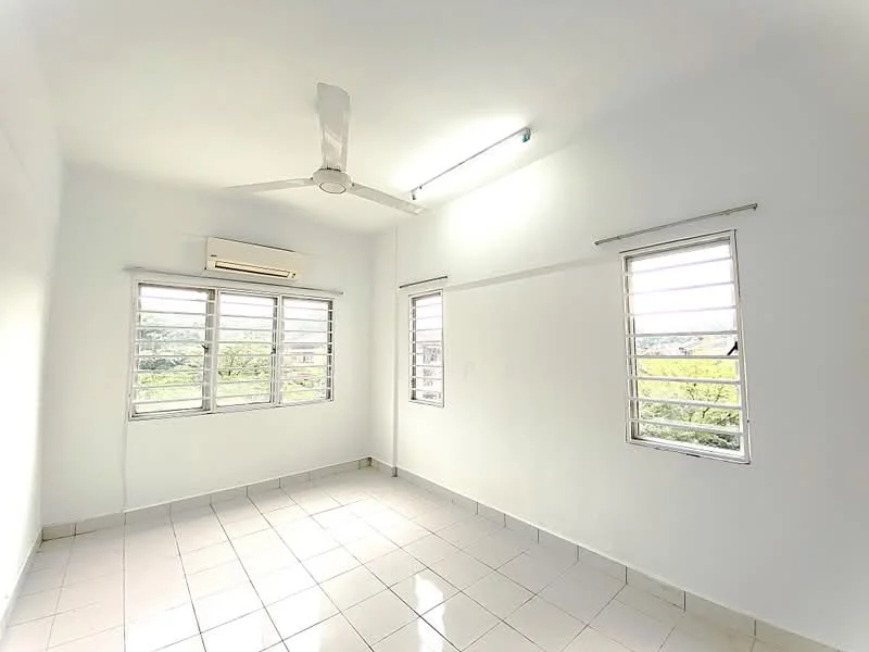 Room features: white painted walls, white ceiling, sliding windows with metal frames, 1 ceiling fan, 1 wall-mounted air conditioning unit, tile flooring, natural light from windows, view of greenery outside; style: minimalist; view: garden.