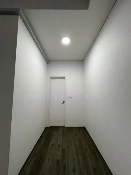 Room features: white painted walls, wooden flooring, recessed ceiling light, single door, no visible windows; style: modern.