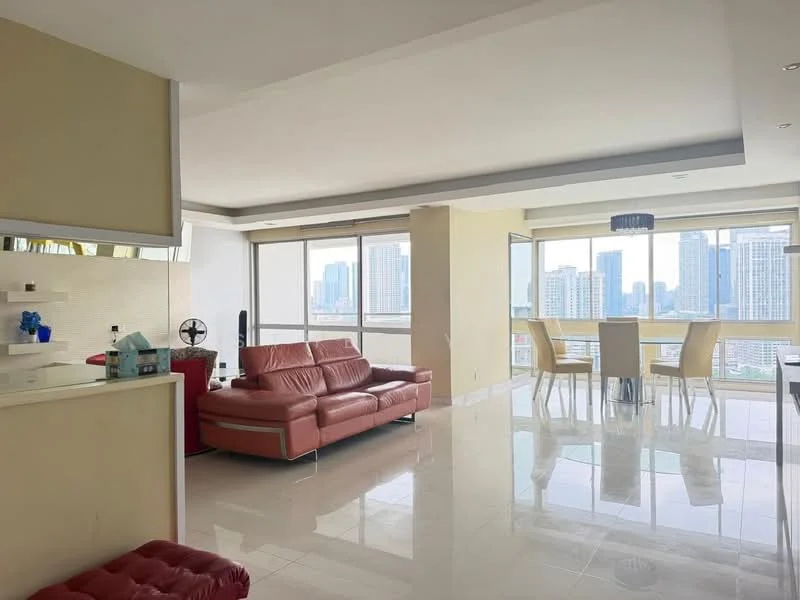 Living features: red leather sofa, coffee table, floor-to-ceiling windows, city skyline view, marble tile flooring, recessed downlights, open layout, decorative wall with mirror, dining area with glass-top table, upholstered dining chairs; style: modern; view: city.