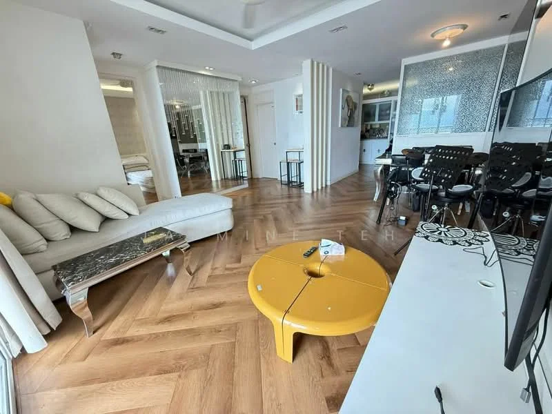 Living features: L-shape sectional sofa in cream, coffee table with marble top, yellow round coffee table, wooden herringbone flooring, wall-mounted TV, decorative wall art, recessed ceiling lights, large windows with natural light, open layout to dining area, decorative partition wall; style: modern.