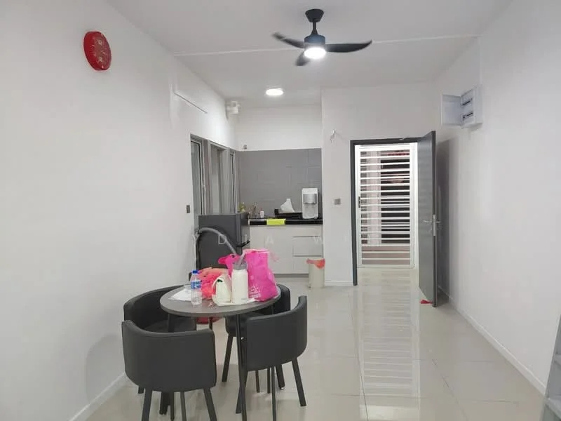 Room features: white painted walls, grey tiled flooring, ceiling fan, round dining table, 4 grey dining chairs, kitchen area with grey backsplash, kitchen cabinets, sink, refrigerator, countertop, wall-mounted light fixtures, fire alarm, open layout; style: modern.