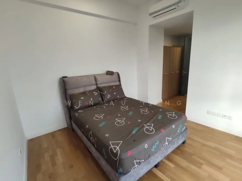 Bedroom features: queen-size bed with grey upholstered frame, bedding with geometric pattern, wooden flooring, white painted walls, wall-mounted split AC, built-in wardrobe with wooden doors, window with natural light; style: modern.