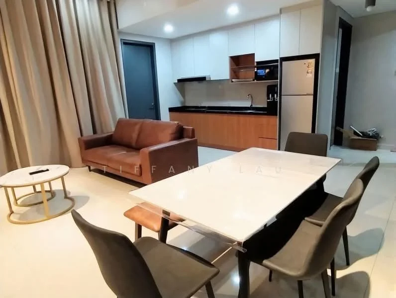Living features: brown leather sofa, glass coffee table with gold frame, 6-seater dining table with white marble top, black dining chairs, kitchenette with black countertop, white cabinetry, stainless-steel fridge, built-in oven, recessed lighting, cream tiled flooring, floor-to-ceiling curtains; style: modern.