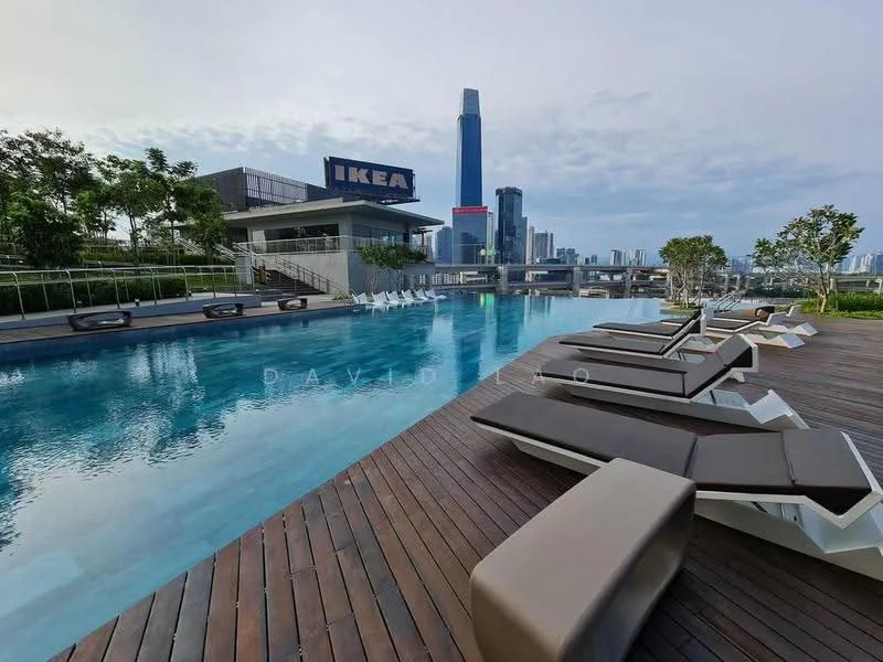 Exterior type: swimming pool deck; features: infinity pool, pool deck with loungers, wooden decking, surrounded by greenery, city skyline view, modern architecture, IKEA building in background; style: modern.