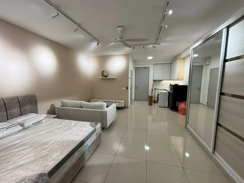 Living features: grey upholstered bed, white fabric sofa, recessed LED downlights, ceiling fan, glossy tile flooring, built-in wardrobe with sliding doors, kitchen area with cabinetry, stainless-steel fridge, white countertop, wall-mounted clock; style: modern.