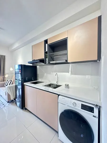 Kitchen features: light brown cabinetry, white countertop, double-bowl stainless-steel sink, chrome pull-down faucet, built-in stove with two burners, black refrigerator, front-load washing machine, white tiled backsplash, white tiled flooring, open shelving above sink, dish rack, wall-mounted cabinet; style: modern.
