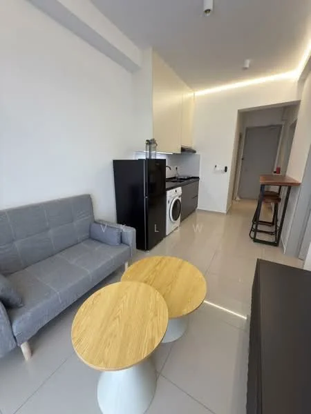 Living features: grey fabric sofa, two round wooden coffee tables, black refrigerator, built-in oven, stainless-steel range hood, white cabinetry, grey tiled flooring, recessed LED downlights, wall-mounted TV, open layout, doorway to hallway; style: modern.
