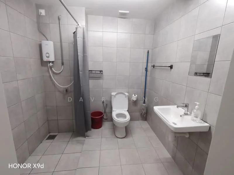 Bathroom features: grey tiled walls, grey tiled flooring, one-piece toilet, wall-mounted sink, chrome basin mixer faucet, shower with handheld showerhead, shower curtain, wall-mounted mirror, wall-mounted towel rack, water heater, red waste bin; style: modern.