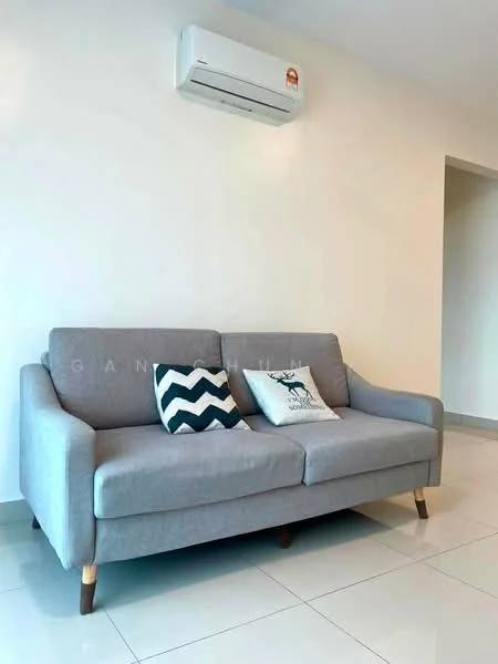 Living features: grey fabric 3-seater sofa, decorative cushion with chevron pattern, decorative cushion with deer graphic, white painted walls, glossy white tile flooring, wall-mounted split AC unit; style: modern.
