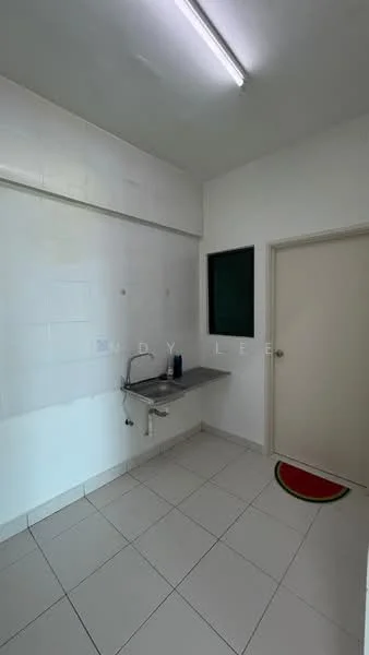 Laundry features: white tiled walls, white tiled flooring, single-bowl stainless-steel sink, chrome faucet, window with green frame, plain white cabinetry, fluorescent ceiling light, door with handle, watermelon-shaped mat.