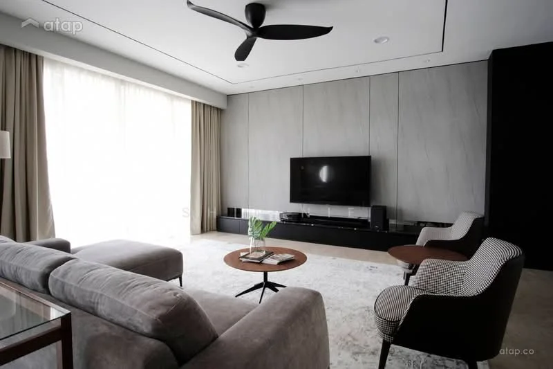 Living features: 3-seater fabric sofa in grey, 2-seater armchair with checkered pattern, round coffee table with wooden top, wall-mounted TV, media console below TV, light-colored area rug, floor-to-ceiling windows with sheer curtains, ceiling fan, recessed downlights, grey accent wall with textured finish; style: modern.
