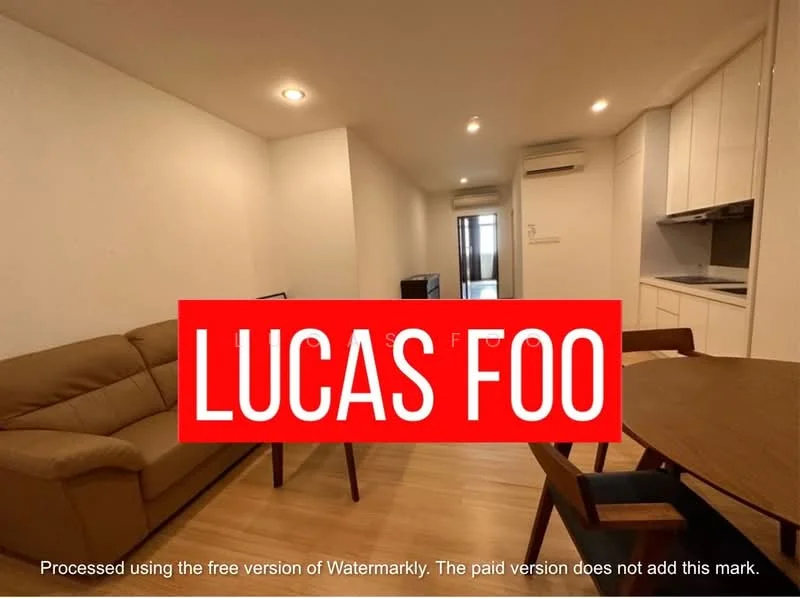 Living features: light wood flooring, cream painted walls, sofa in beige, coffee table, wall-mounted TV, recessed downlights, air conditioning unit, open kitchen layout, kitchen cabinetry in white, kitchen countertop in light color; style: modern.