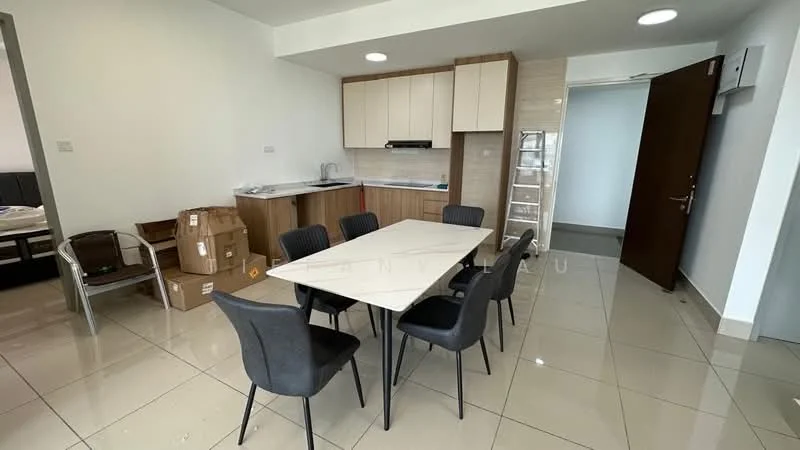 Dining features: 6-seater dining table, upholstered dining chairs, white walls, glossy tile flooring, kitchen cabinetry in light wood, countertop in light color, stainless-steel sink, built-in kitchen appliances, open layout, boxes stacked in corner, recessed ceiling lights; style: modern. Room features: grey sofa, bed visible in background, open doorway.